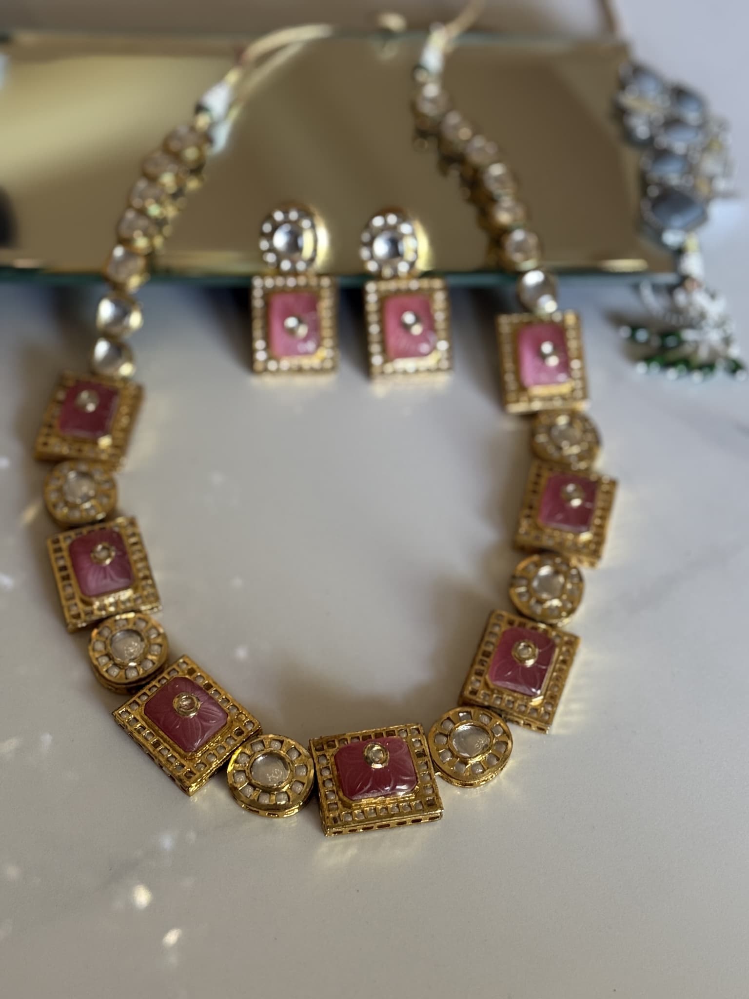 carved-ruby-kundan-necklace-set