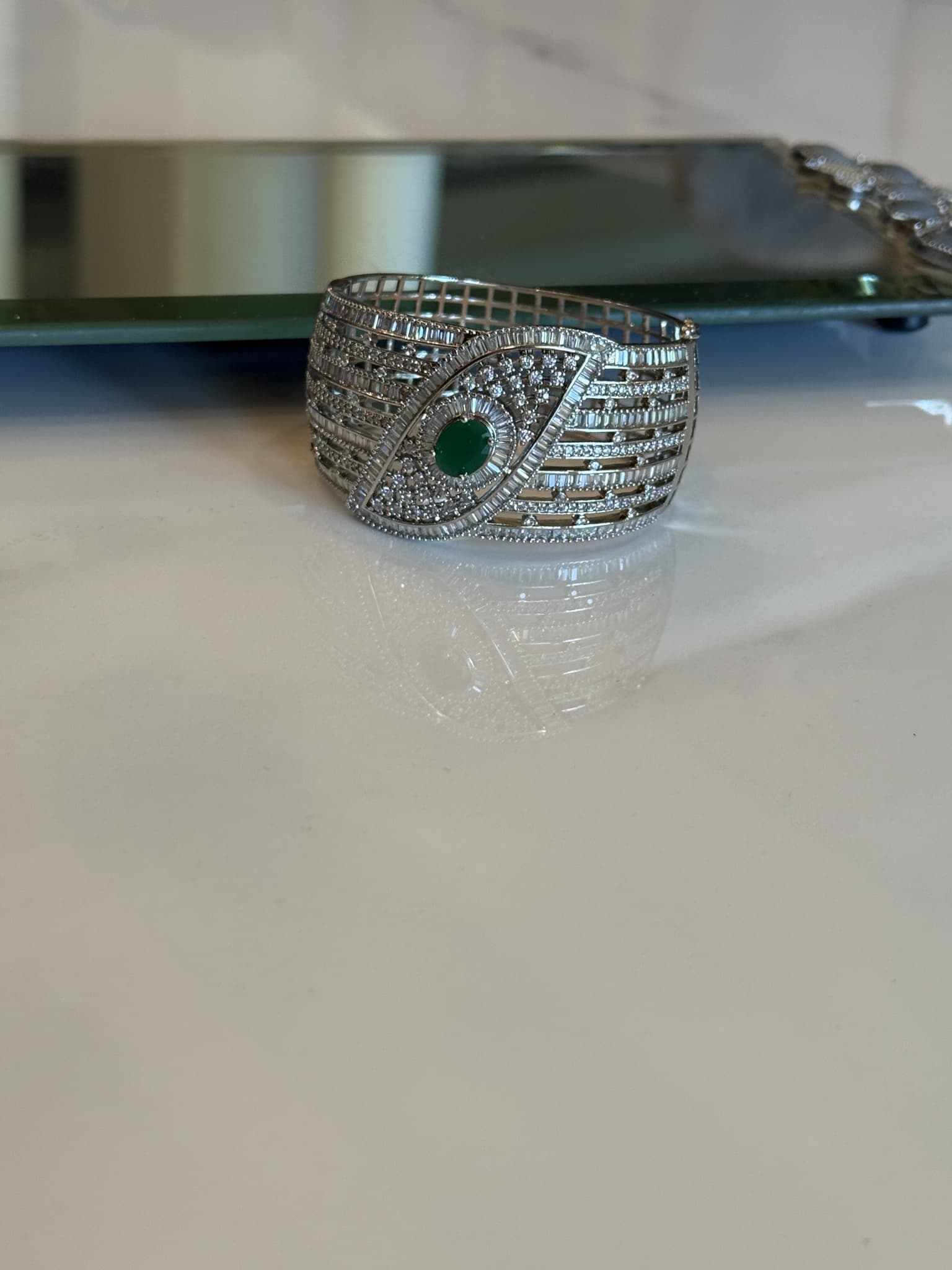 Wide Silver Cuff with Emerald and Diamond Eye Motif