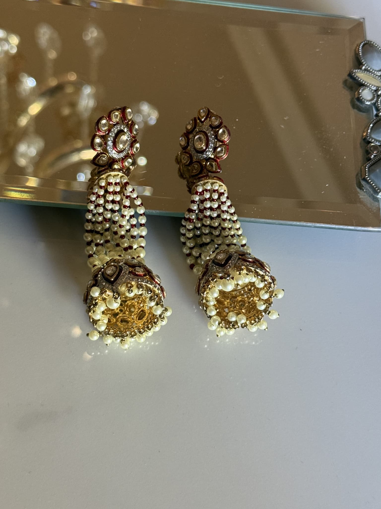 kundan-pearl-multi-strand-jhumka-earrings