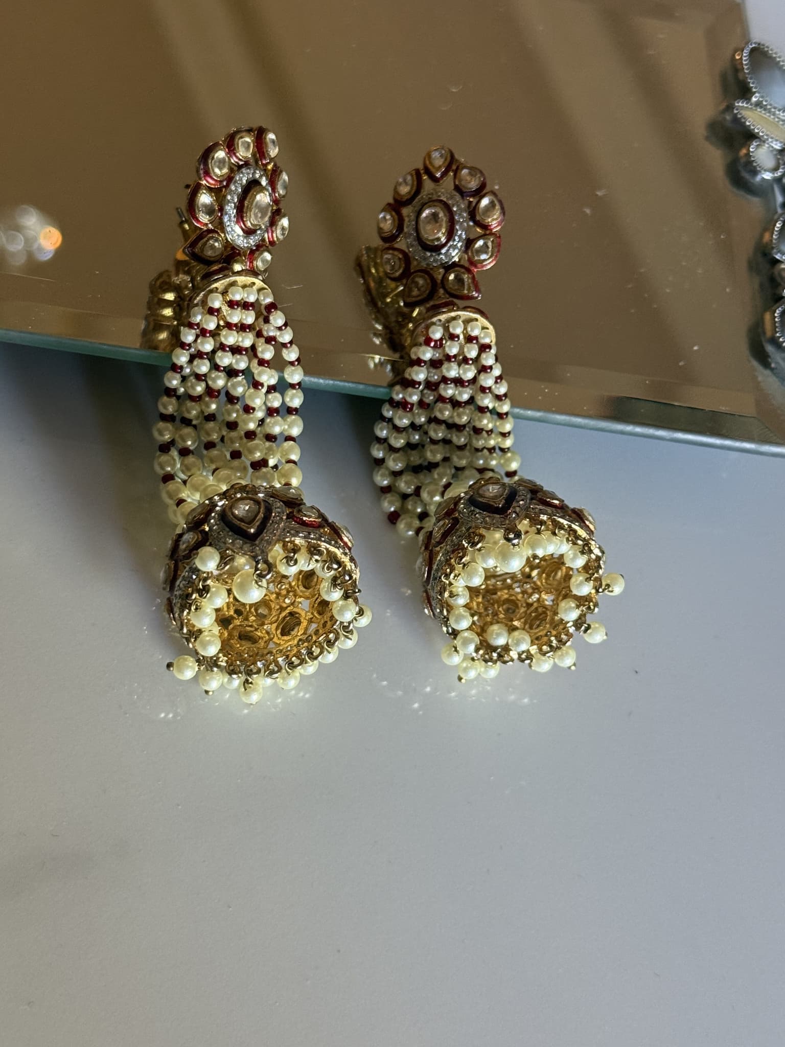 kundan-pearl-multi-strand-jhumka-earrings