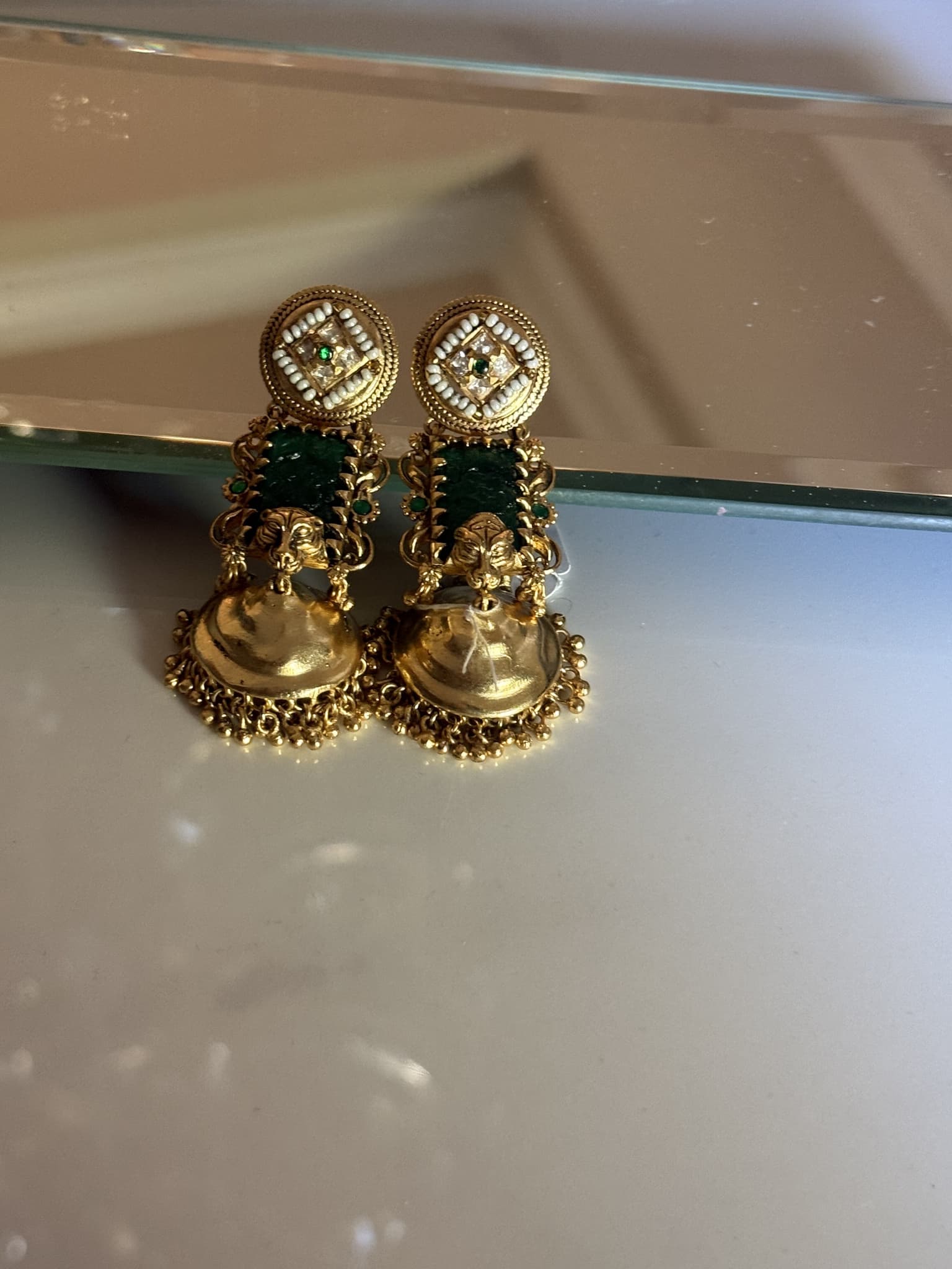 Antique Gold Lion Motif Jhumka Earrings