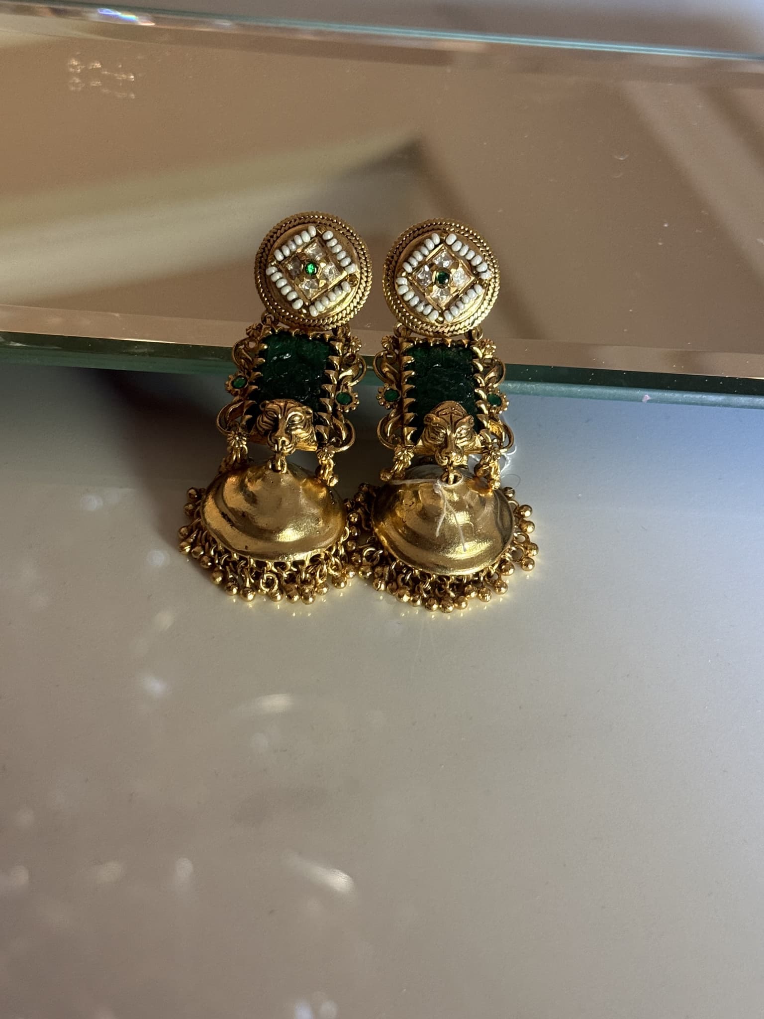 Antique Gold Lion Motif Jhumka Earrings