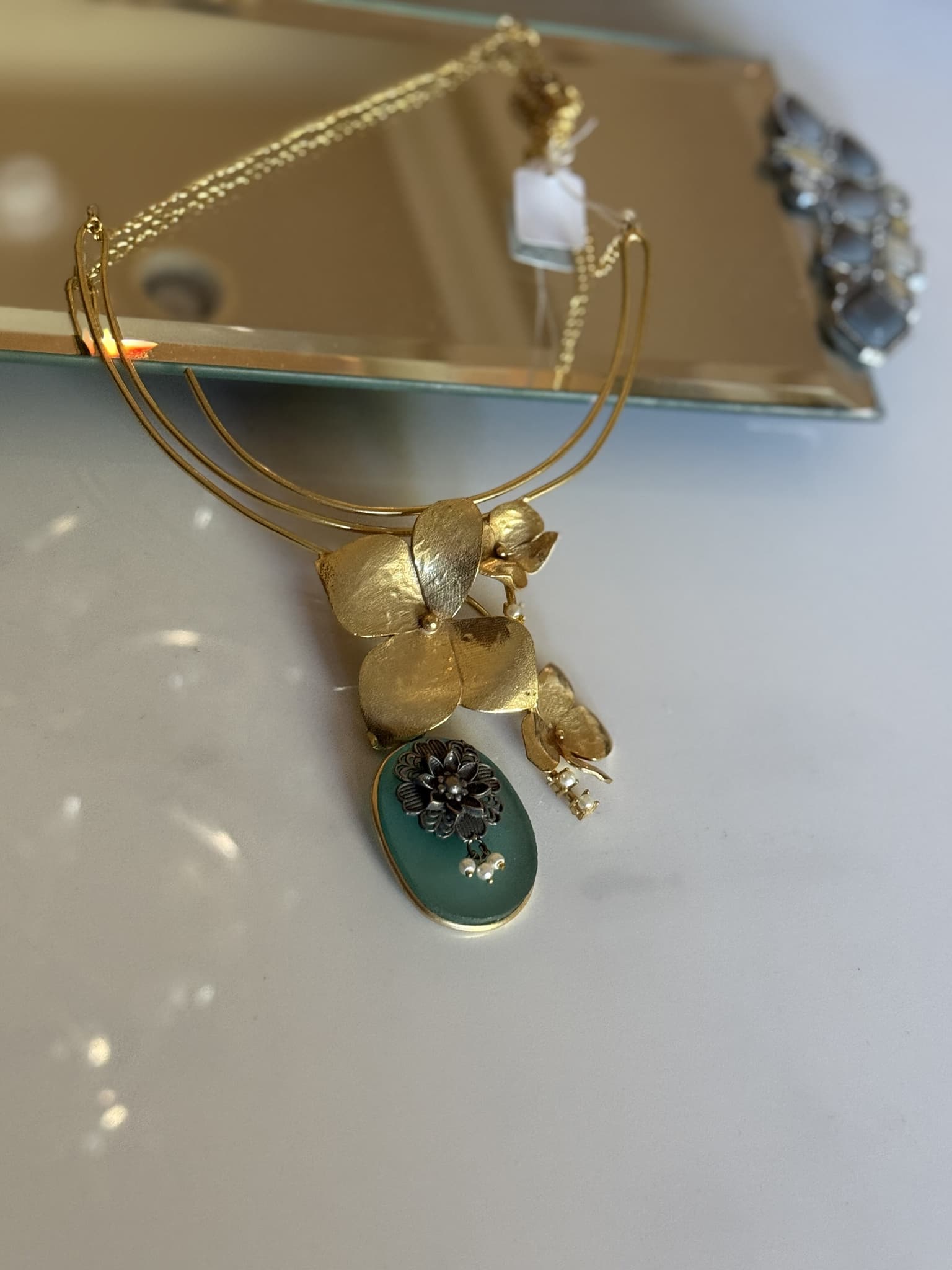 Gold Floral Pendant Necklace with Green Drop