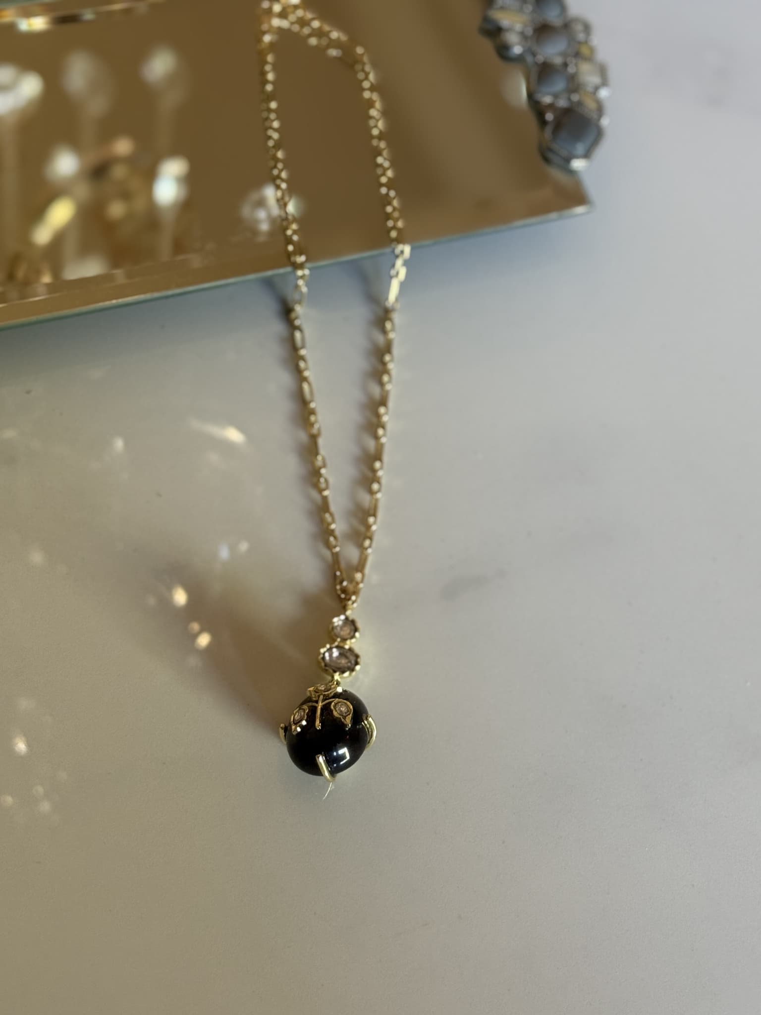 Onyx and Crystal Pendant Necklace