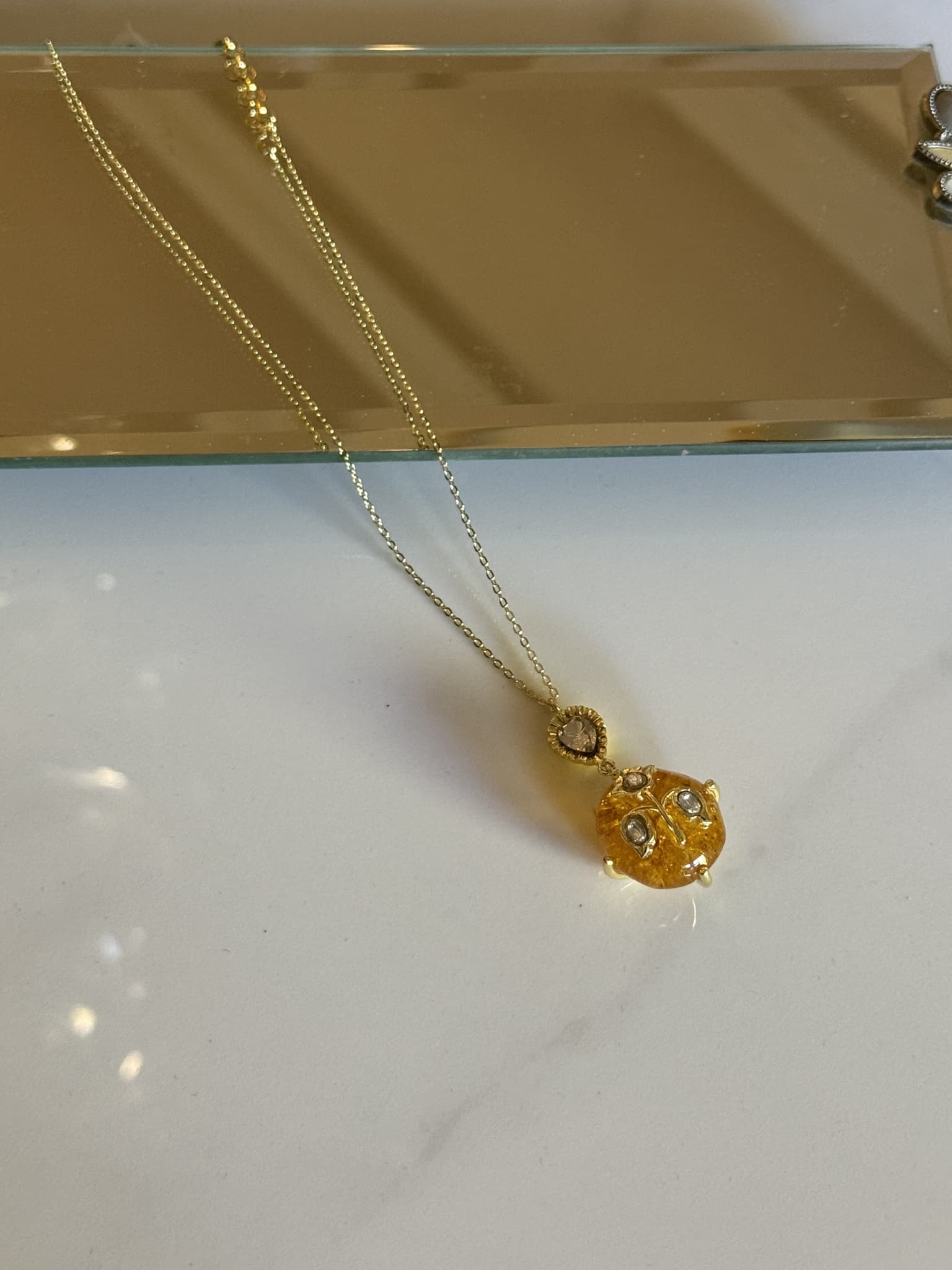 Golden Resin and Crystal Pendant Necklace