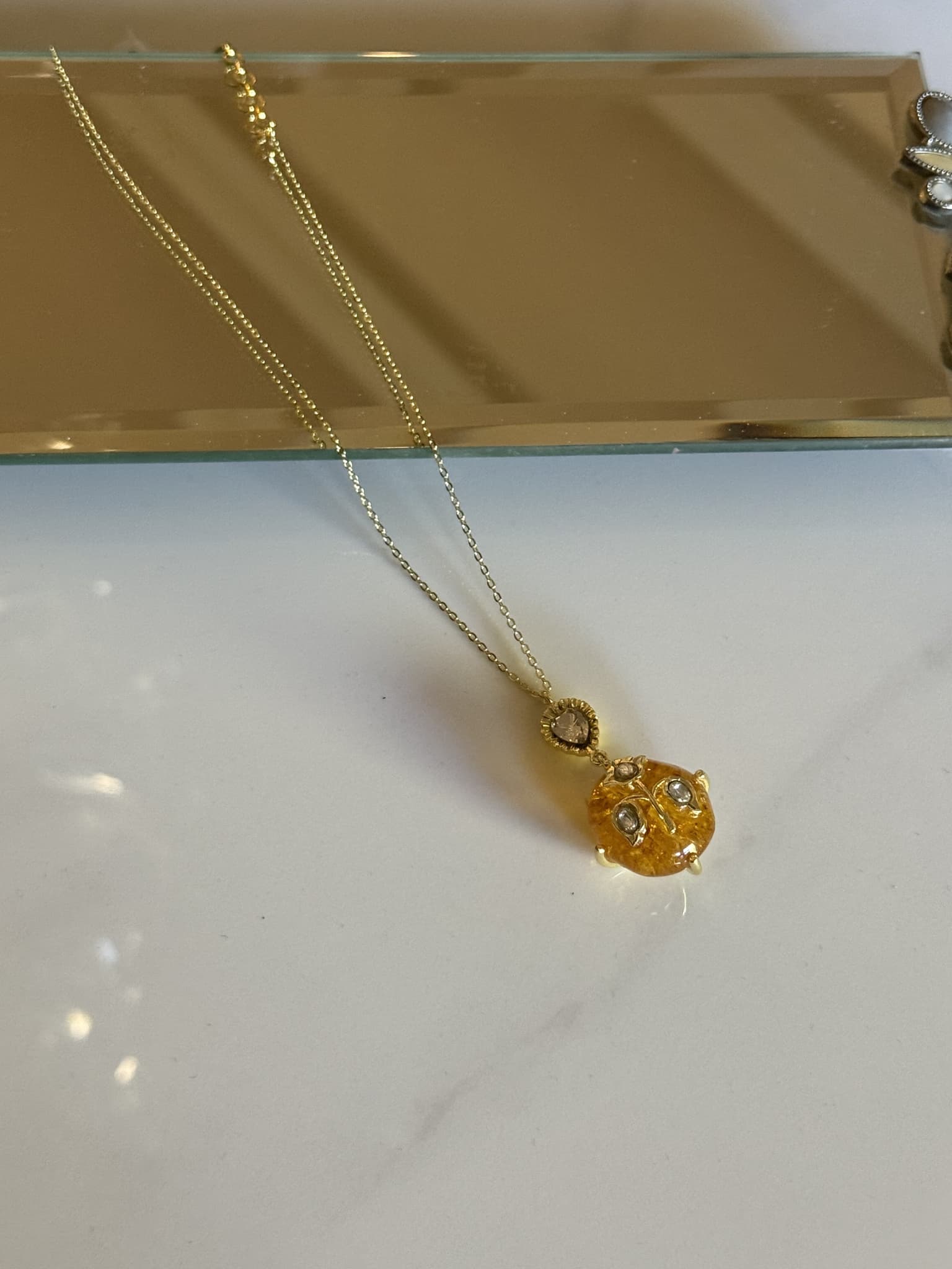 Golden Resin and Crystal Pendant Necklace